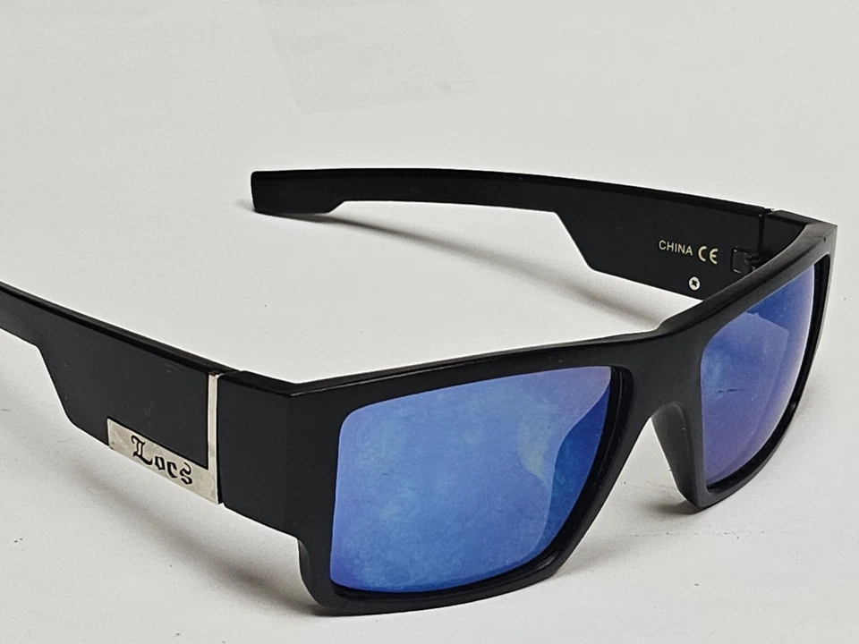 Gafas de sol de diseñador Locs negras envolventes planas Foto 2 de 4