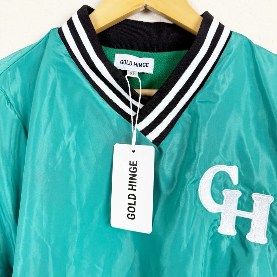 Pullover verde con bisagra dorada cuello en V talla XS Foto 3 de 4