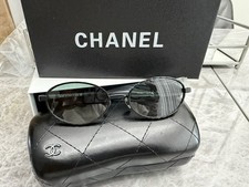 CHANEL Oval Women's Black Sunglasses Designer Solid Metal Plastic