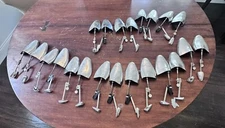 11 pair of vintage Alan McAfee shoe trees