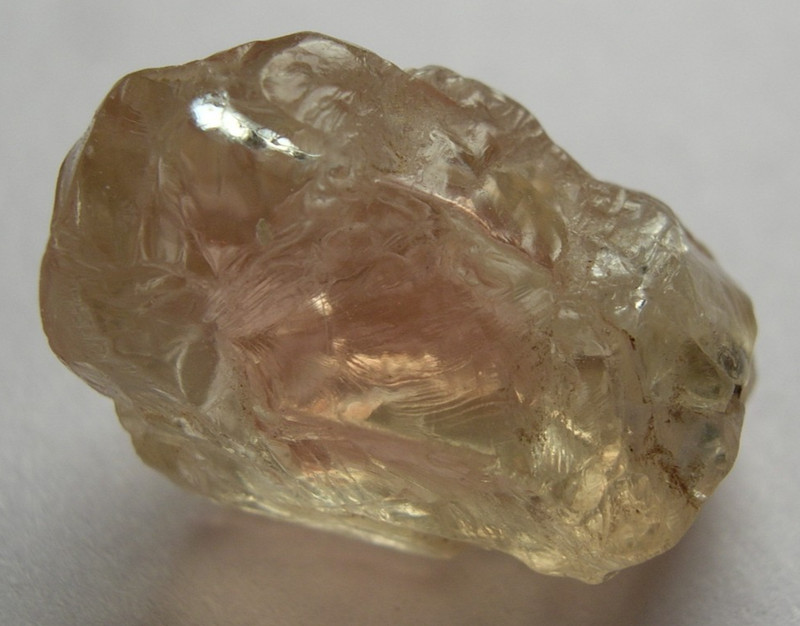 SUNSTONE, LIGHT RED WITH A SLIGHT COPPER SHILLER, FOR FACETING, OREGON, U.S.A.