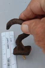 nautical screw in wall hook looks like the end of a tentacle from an octopus or