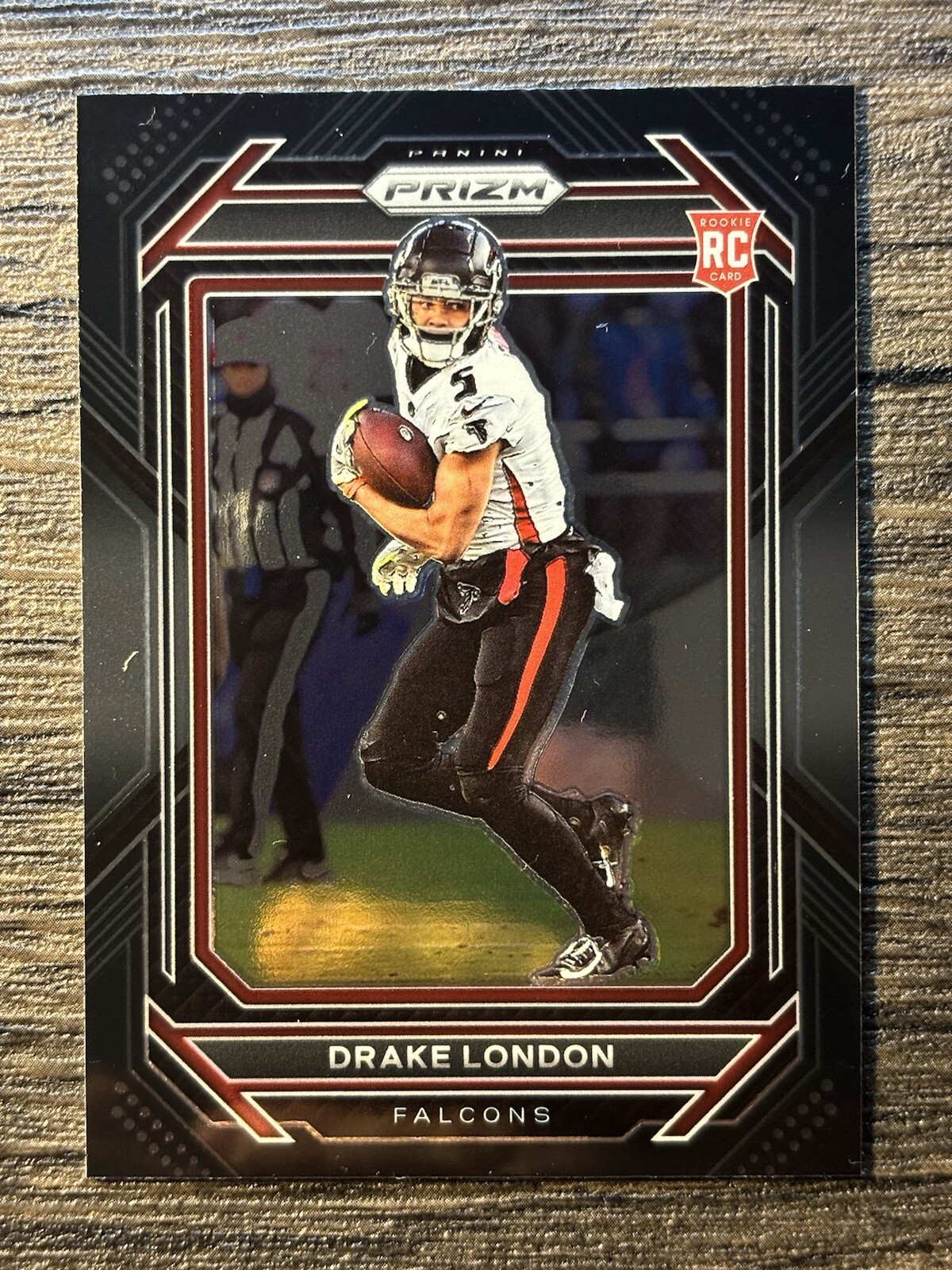 2022 Panini Chronicles - Prizm Black Silver #PB-11 Drake London (RC)