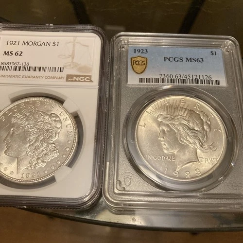 Silver MORGAN 21 & PEACE 23. Ms 62/63 NGC/PCGS SILVER DOLLATS. DUO