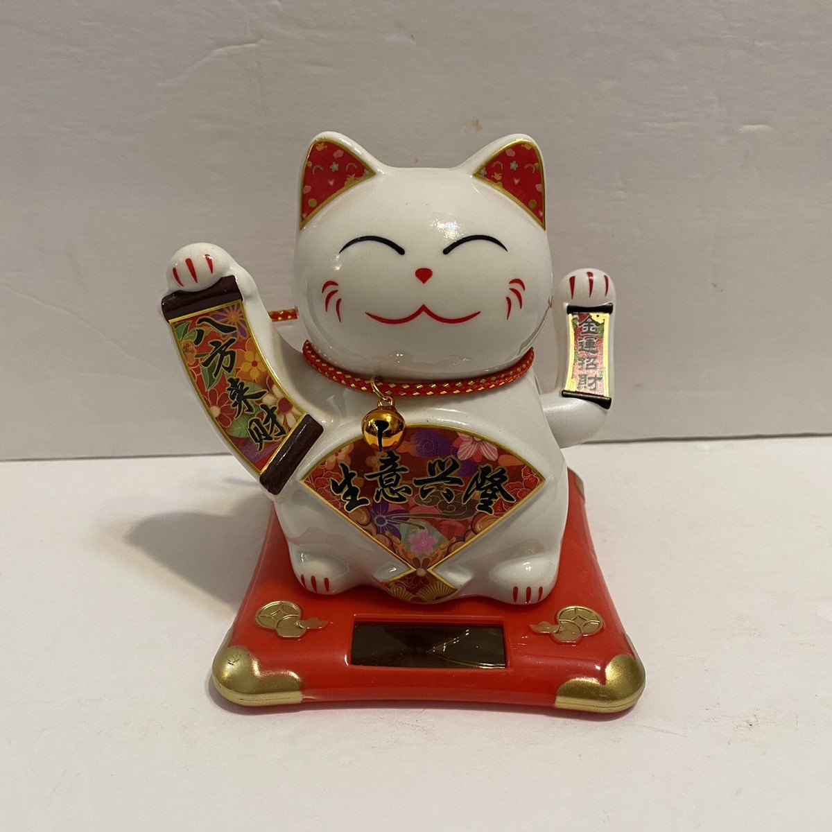 Solar Porcelain Lucky Hands Waving Fortune Cat-- Business is