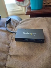 Portable 4 Port SuperSpeed Mini USB 3.0 Hub.