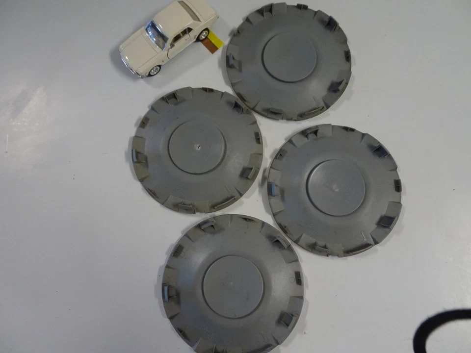 Juego de 4 tapacubos centrales de rueda OEM 2002-04 Kia Spectra # 0K2NA 37 190, 1K2NA 37 190 Foto 4 de 4