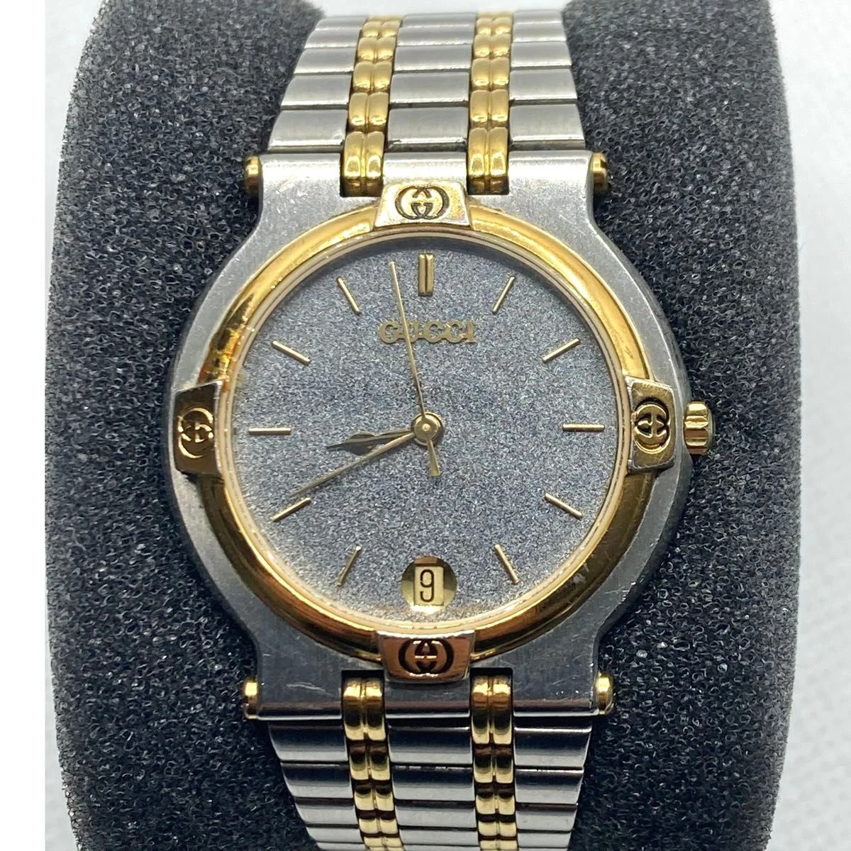 Montre unisexe GUCCI 9000M cadran noir deux tons quartz occasion très bon état !