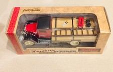    ERTL VINTAGE 1997 TRUE VALUE 1931 HAWKEYE FLATBED METAL TRUCK 1:34   