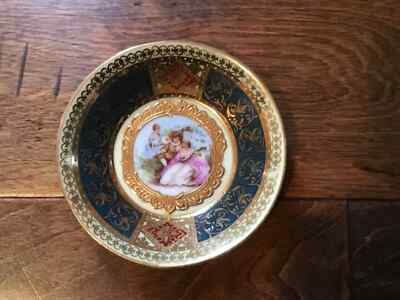 ANTIQUE ROYAL VIENNA AUSTRIA PORCELAIN FOOTED CUP AND SAUCER
