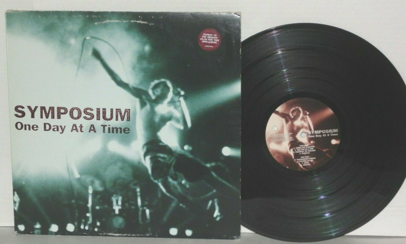 SYMPOSIUM One Day At A Time LP VG+ Plays Well UK 1997 INFECT49S 