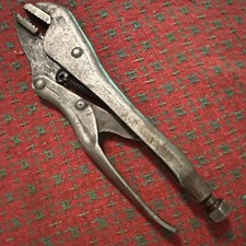 Empuñadura de tornillo de palanca de bloqueo patentada original Petersen. Dewitt Nebraska. Patente 1924