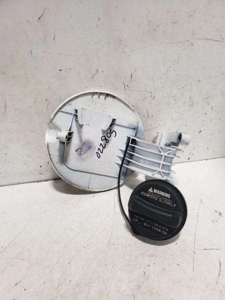 Puerta de llenado de combustible Rondo 2009 719975 Foto 2 de 4