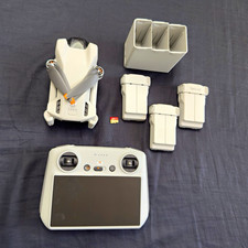 DJI Mini 3 W/ DJI RC, Fly More Kit. 3 Batteries  charger , SD card and extras