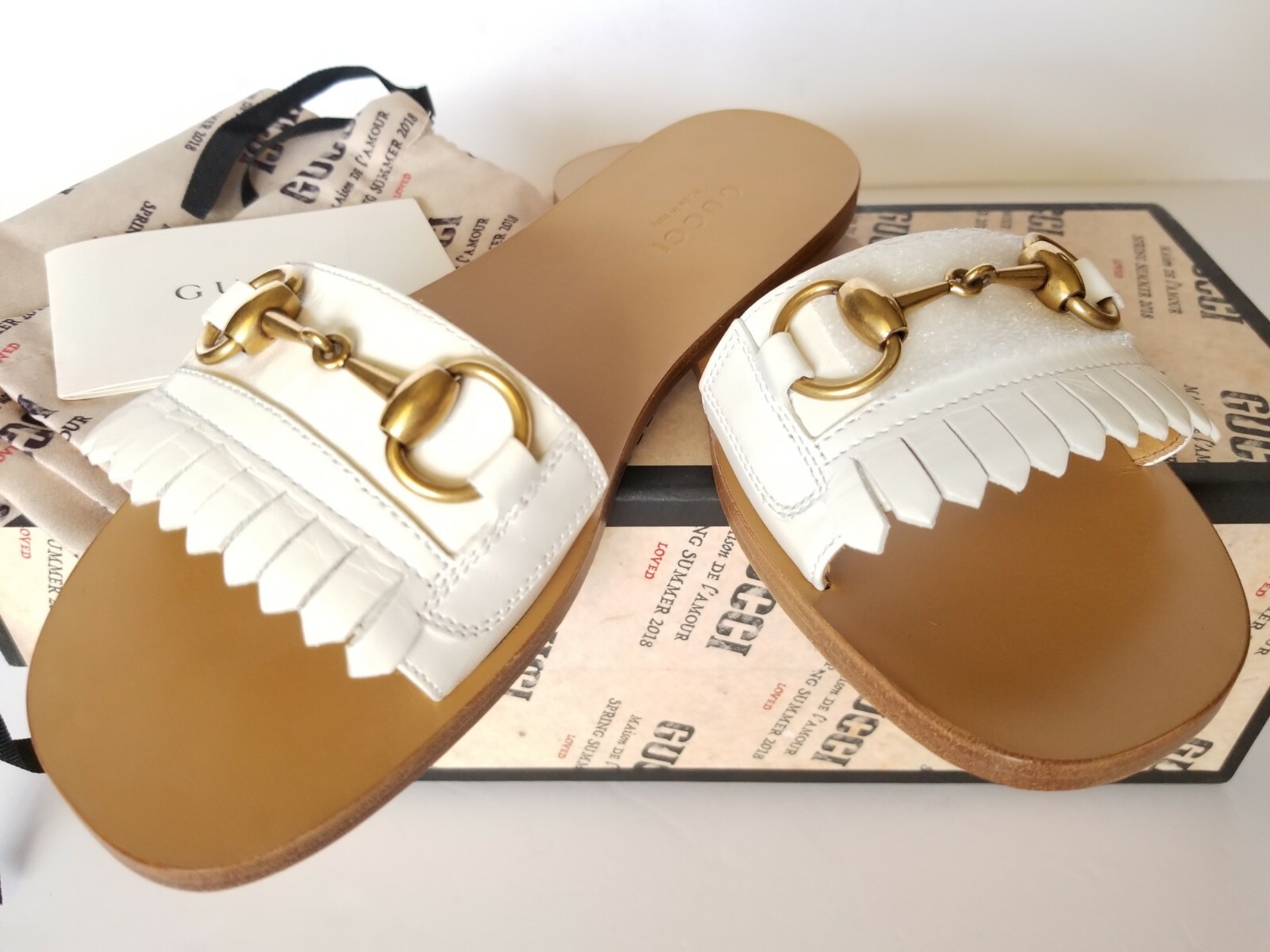 gucci slides off white