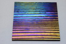 0100.46 - 3" x 3" IRIDIZED ACCORDION TEXTURE ON BLACK BULLSEYE 3mm GLASS 90 COE