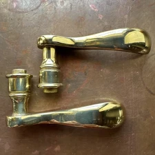 Pair of Baldwin Estate wave handles Lever