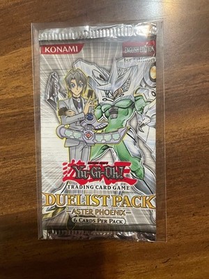 yugioh duelist pack aster phoenix 1st edition booster pack sealed and in sleeve 
