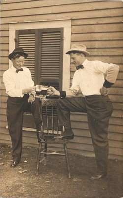 TWO GUYS TOASTING BEER c1910 postcard real photo rppc portrait fun beverage
