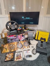 Black PlayStation 2 (PS2) Slim Bundle, Racing Wheel & 3 Games