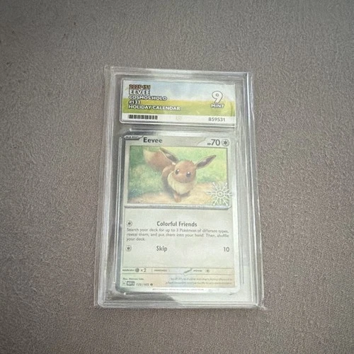Eevee (Holiday Calendar) 133/165 Cosmos Holo snowflake stamp Ace graded 9