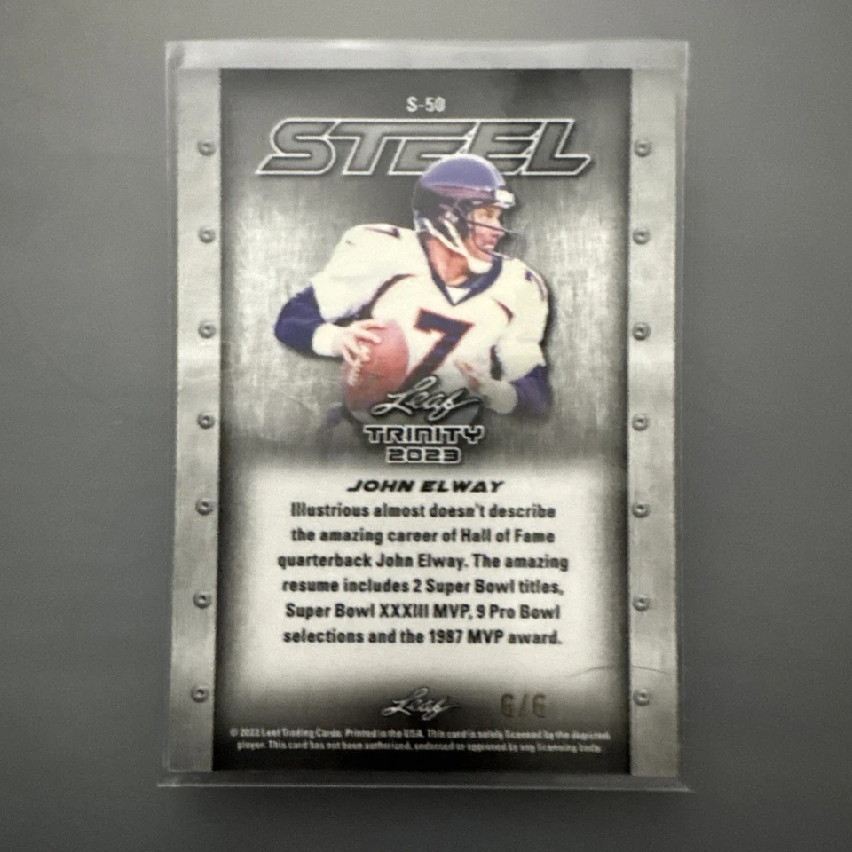 Hoja Trinity 2023 - Trinity Steel John Elway #S-50 círculos de rosquilla naranja/6 Foto 2 de 3