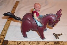 BUCKING BRONCO COWBOY CELLULOID WIND UP TOY JAPAN 1930s WORKS