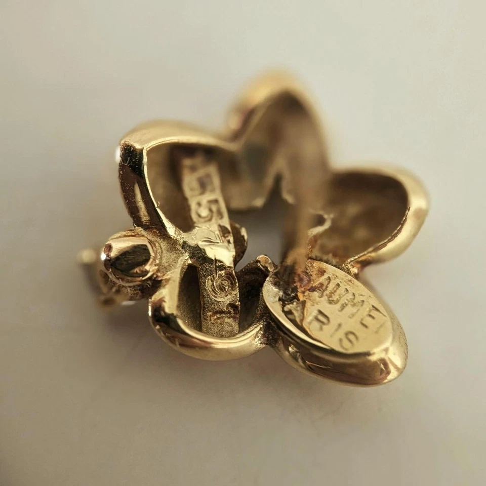 Aretes vintage Chaumet Paris de oro amarillo de 18 k con detalles de diamantes con flores Foto 3 de 4