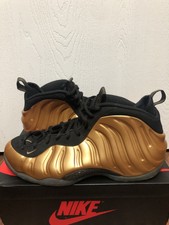 nike air foamposite one metallic gold
