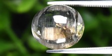 Scapolite rutilé oeil de chat de 9.64Cts en cabochon ovale
