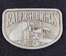 Vintage Raleigh Lights Belt Buckle Collectible Trucker Buckle Theme Well Used