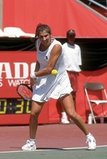 Monica Seles of Yugoslavia hits a return at a women's singles matc- Old Photo 14