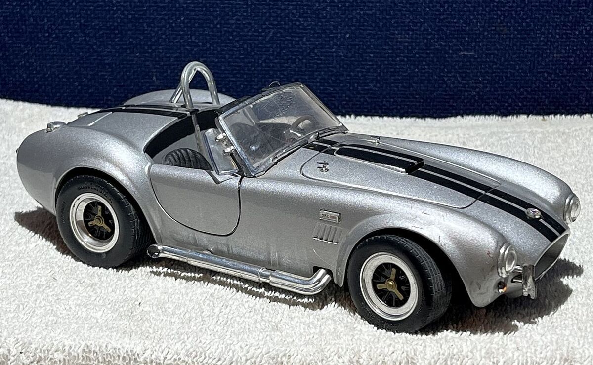 1964 SHELBY COBRA 427 S/C ROADSTER SILVER & BLACK ROAD 1964 SHELBY COBRA 427 S/C ROADSTER SILVER & BLACK ROAD