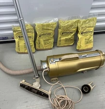 Electrolux Vacuum, Vintage,  Canister Model L, with all original accessories.
