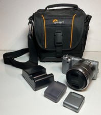 Sony Alpha NEX-5N 16.1MP Digital Camera  Lens, HLV-F7S Flash, Charger, Lowepro