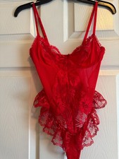 Red Victoria's Secret lace teddy featuring ruffled hip details. With pennies. M
