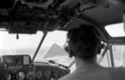 Radio writer and host Norman Corwin is photographed flying over 1940s Old Photo