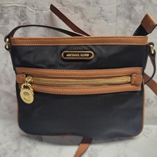 Borsa a tracolla Michael Kors nera nylon marrone bordo pelle oro ferramenta lucchetto