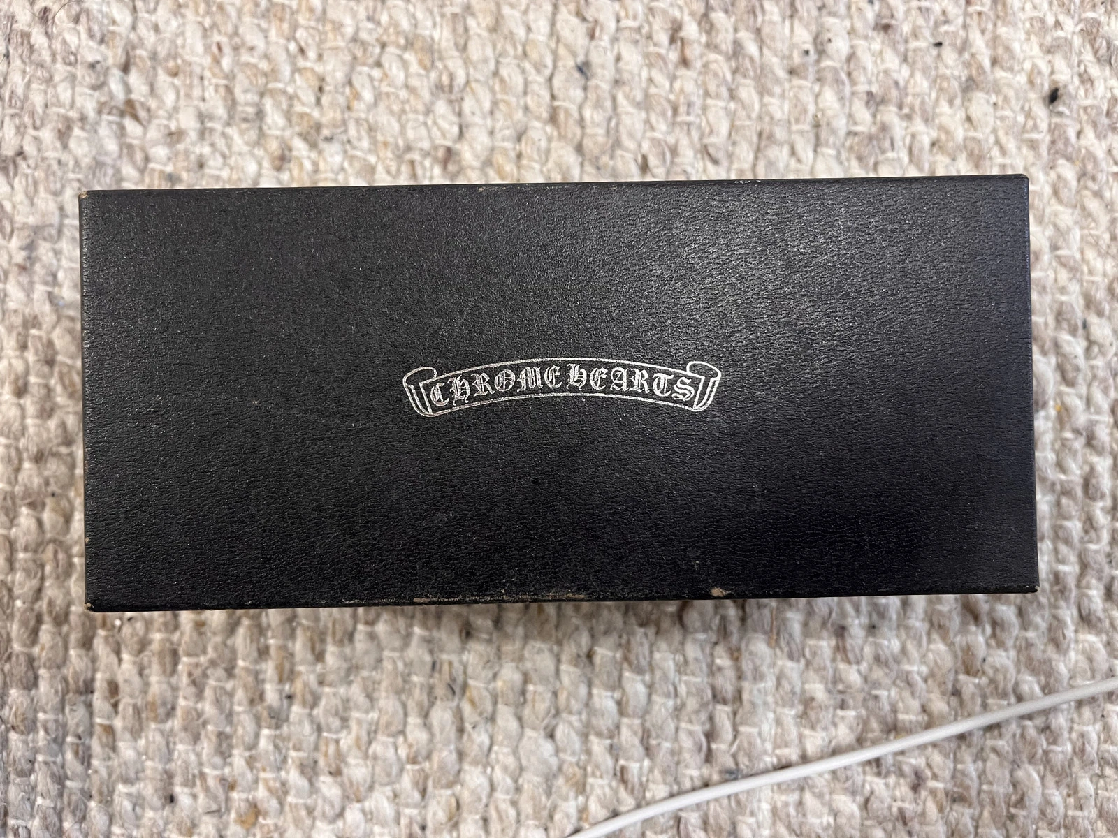 chrome hearts handheld leather bag with silver charm