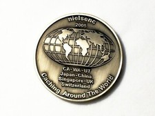 2005 Nielsenc Caching Around the World - Silver Finish - New Unactivated Geocoin