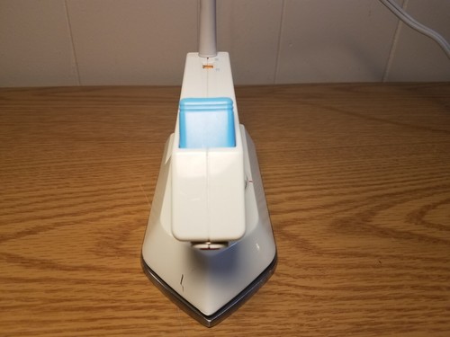 Hierro seco plegable de viaje vintage Norelco TI-65 con pulverizador doble voltaje A10 - Imagen 8 de 14