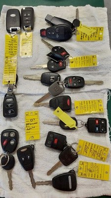 12 Misc key Fobs Oem . See Description For List