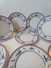 8 assiettes porcelaine de