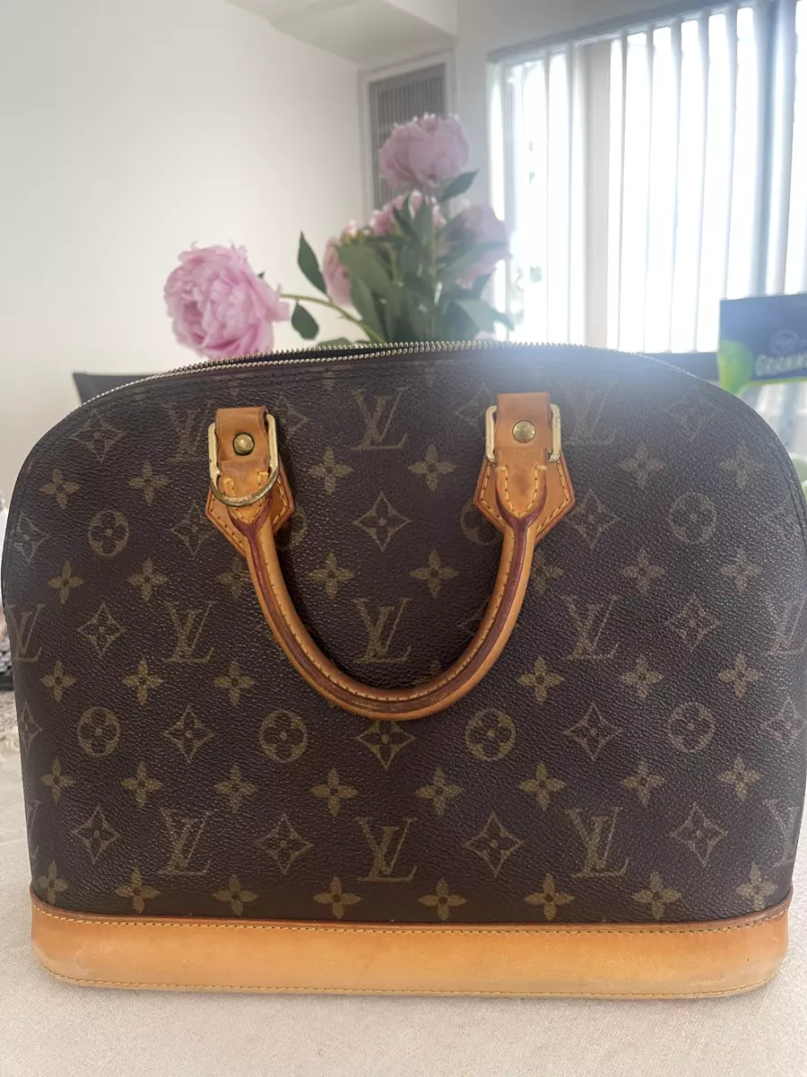 Louis Vuitton Alma Handbag