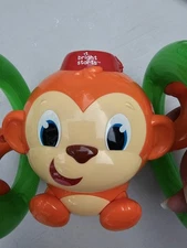 Bright Starts Roll & Glow Monkey Crawling Baby Toy with Lights and Sounds