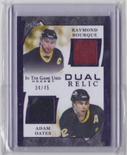 2023 LEAF ITG USED DUAL RELIC PURPLE FOIL/45 R. BOURQUE & A. OATES #GDR15 BRUINS
