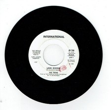 The TWINS - OLE OLE Vinyl 45T 7" LOVE SYSTEM - ES UN JUEGO Juke Box JB 796 RARE