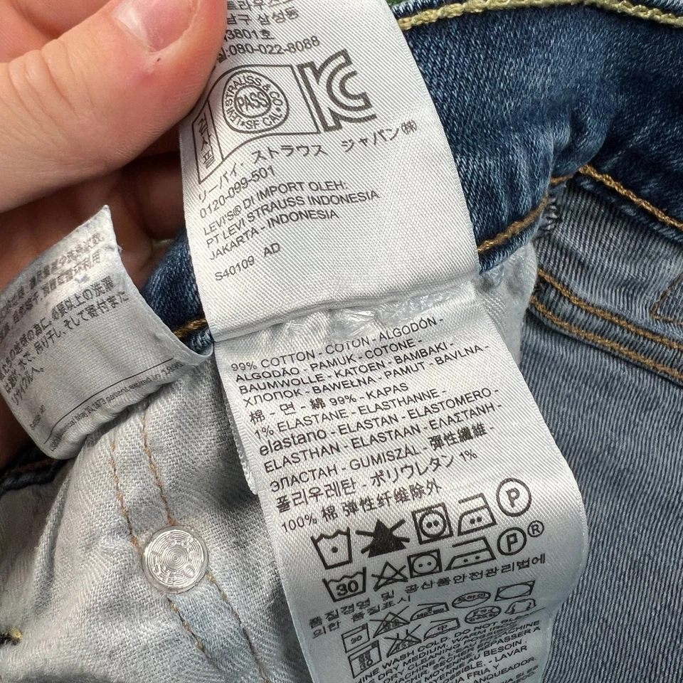 Jeans Levi's 513 ajustados rectos con cremallera lengüeta roja para hombre 33x30" azul lavado medio Foto 3 de 4