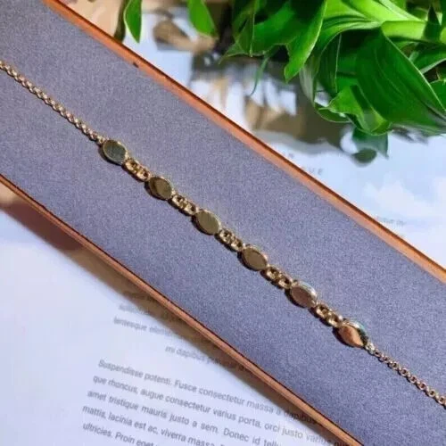 Brazalete para mujer de diamantes de ópalo de fuego creado en laboratorio ovalado de 8 quilates enchapado en oro amarillo de 14 quilates Foto 3 de 4