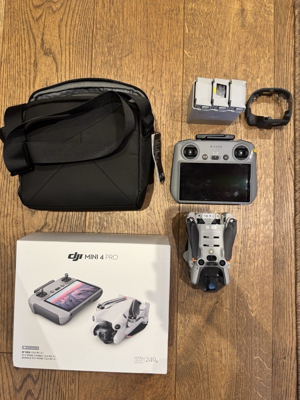 DJI Mini 4 Pro Ready to Fly Drone w/ DJI RC 2, bag, batteries, 34 min, 249g